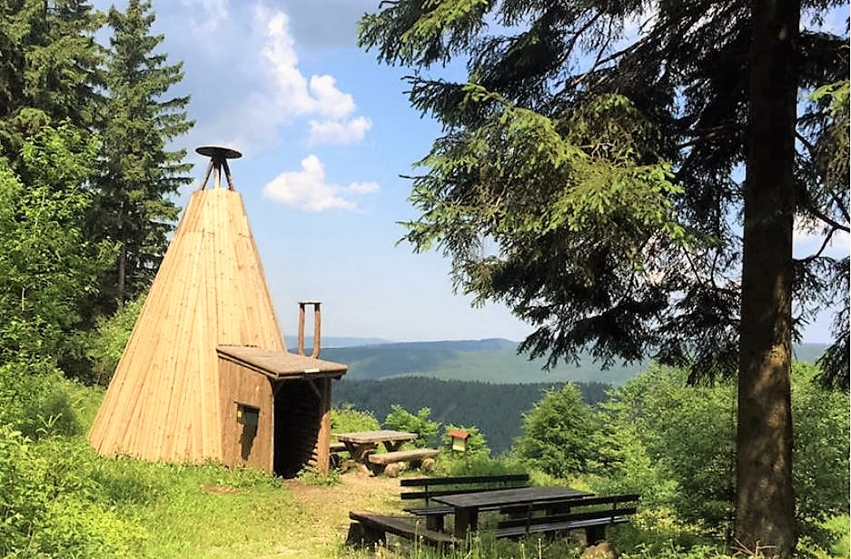 Wooden hut in the forest with panoramic views